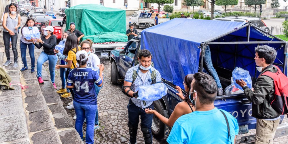Antigua,, Guatemala -  June 5, 2018:  Volunteers load supplies outside town hall to take to area affected by eruption of Fuego (fire) volcano on June 3. Currently official figures say 121 people died & 300 missing.